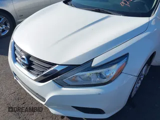 2016 Nissan Altima S with VIN 1N4AL3AP9GN355504, listed as a IAAI auction lot 42631887 with 122,957 mi miles and . Bid and sale history available at DreamBid. Image 6.