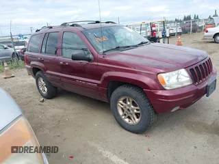1999 Jeep Grand Cherokee Limited with VIN 1J4GW68N3XC696825, listed as a IAAI auction lot 42117857 with 236,300 mi miles. Bid and sale history available at carsss.com. Image 1.