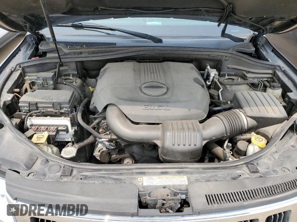 2011 Jeep Grand Cherokee Laredo with VIN 1J4RR4GGXBC567450, listed as a Copart auction lot 60056085 with 165,077 mi miles and Salvage title. Bid and sale history available at DreamBid. Image 11.