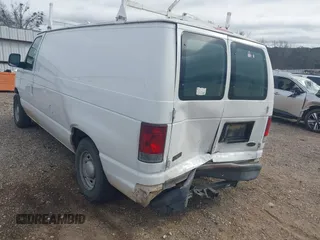 2004 Ford Econoline Cargo with VIN 1FTRE14WX4HA06537, listed as a IAAI auction lot 41745018 with 246,963 mi miles. Bid and sale history available at carsss.com. Image 13.