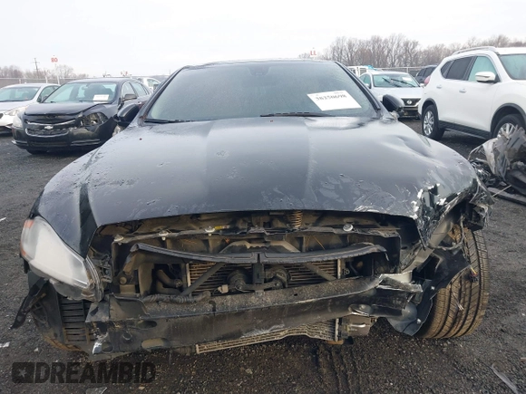 2014 Jaguar XJ with VIN SAJWA1CZXE8V74400, listed as a IAAI auction lot 38250698 with 102,205 mi miles and . Bid and sale history available at DreamBid. Image 13.