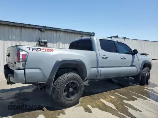 2020 Toyota Tacoma SR5 z VIN 3TMDZ5BN0LM094976, wystawiony jako Copart lot #58695515 z przebiegiem 84 025 mil mil oraz Czysty tytuł • Clean title. Historia ofert i sprzedaży dostępna na DreamBid. Obrazek 3.