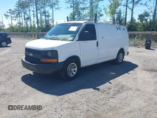 2010 Chevrolet Express Cargo Van with VIN 1GCUGADX2A1146132, listed as a IAAI auction lot 41872766 with 167,063 mi miles. Bid and sale history available at carsss.com. Image 2.