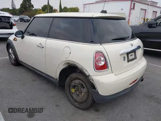 2011 MINI Hardtop with VIN WMWSU3C56BT093403, listed as a IAAI auction lot 42795188 with 123,454 mi miles and . Bid and sale history available at DreamBid. Image 3.