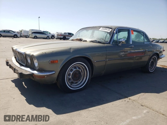 1974 Jaguar XJ with VIN UE2T52398, listed as a Copart auction lot 59589415 with 93,740 mi miles and Clean title. Bid and sale history available at DreamBid. Image 1.