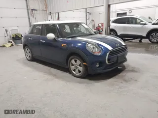 2017 MINI Hardtop 4 Door Cooper with VIN WMWXU1C51H2E18017, listed as a IAAI auction lot 41700947 with 32,306 mi miles. Bid and sale history available at carsss.com. Image 1.