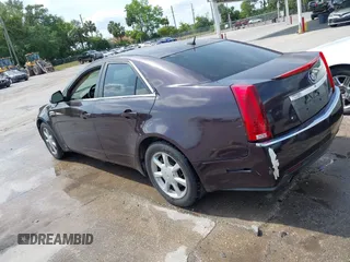 2008 Cadillac CTS RWD w/1SA with VIN 1G6DF577880140148, listed as a IAAI auction lot 42011365 with 156,136 mi miles. Bid and sale history available at carsss.com. Image 2.