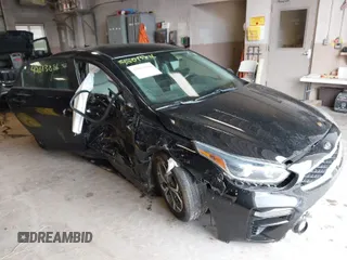 2021 Kia Forte LXS with VIN 3KPF24AD8ME278851, listed as a IAAI auction lot 42013886 with 67,894 mi miles. Bid and sale history available at carsss.com. Image 1.