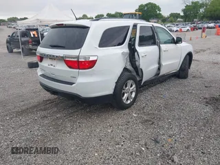 2013 Dodge Durango Crew with VIN 1C4RDJDGXDC693933, listed as a IAAI auction lot 42201796 with 169,051 mi miles and . Bid and sale history available at DreamBid. Image 4.