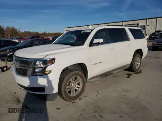 2015 Chevrolet Suburban LT with VIN 1GNSCJKC6FR558394, listed as a Copart auction lot 84620094 with 243,765 mi miles and Salvage Title. Bid and sale history available at carsss.com. Image 1.