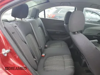 2016 Chevrolet Sonic LT z VIN 1G1JC5SG4G4175558, wystawiony jako Copart lot #57991275 z przebiegiem 133 497 mil mil oraz Szkoda całkowita • Salvage title. Historia ofert i sprzedaży dostępna na DreamBid. Obrazek 10.