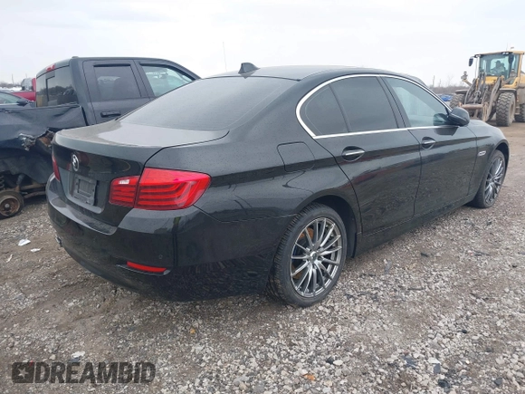 2014 BMW 5 Series 535d with VIN WBAXA5C51ED691018, listed as a IAAI auction lot 41887112 with 174,684 mi miles and . Bid and sale history available at carsss.com. Image 4.