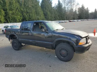 2001 GMC Sonoma SLS with VIN 1GTDT13W61K168519, listed as a Copart auction lot 50601565 with 0 mi miles and Salvage Title. Bid and sale history available at carsss.com. Image 4.