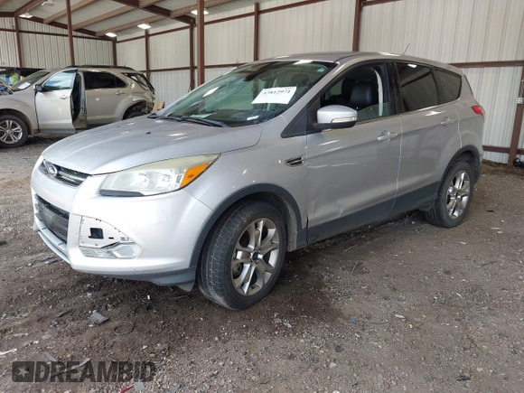 2013 Ford Escape SEL z VIN 1FMCU9HX0DUB99150, wystawiony jako IAAI lot #42812971 z przebiegiem 212 298 mil mil oraz . Historia ofert i sprzedaży dostępna na DreamBid. Obrazek 2.