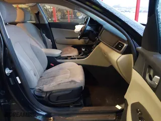 2017 Kia Optima LX 1.6T with VIN 5XXGT4L10HG129660, listed as a IAAI auction lot 40887271 with 107,000 mi miles. Bid and sale history available at carsss.com. Image 5.