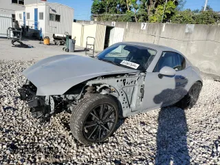 2024 Mazda MX-5 Miata Grand Touring z VIN JM1NDAM76R0603345, wystawiony jako Copart lot #81507834 z przebiegiem 1 749 mil mil oraz Szkoda całkowita • Salvage title. Historia ofert i sprzedaży dostępna na DreamBid. Obrazek 1.