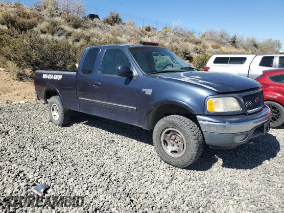 2000 Ford F-150 XL with VIN 1FTRX18L7YKA42575, listed as a Copart auction lot 73034804 with 263,959 mi miles and Non repairable. Bid and sale history available at DreamBid. Image 4.