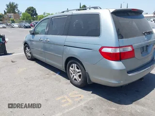 2005 Honda Odyssey EX with VIN 5FNRL38415B086709, listed as a IAAI auction lot 42308829 with 187,351 mi miles and . Bid and sale history available at DreamBid. Image 3.