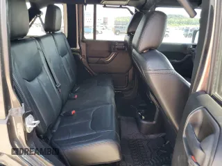 2017 Jeep Wrangler Unlimited Sahara with VIN 1C4BJWEG0HL727423, listed as a Copart auction lot 56719285 with 62,965 mi miles and Salvage title. Bid and sale history available at DreamBid. Image 11.