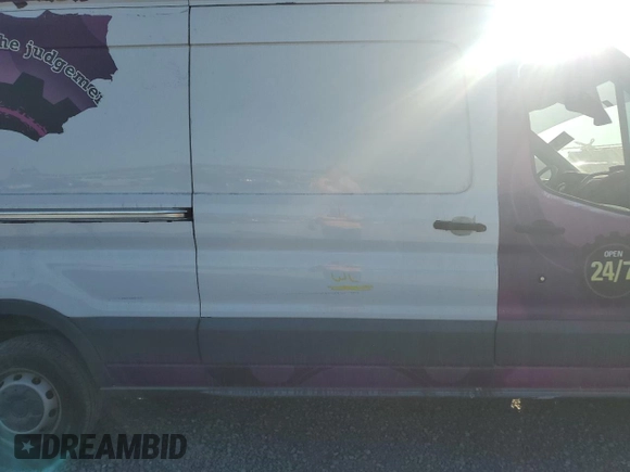 2015 Ford Transit with VIN 1FTSW2XG7FKA57802, listed as a Copart auction lot 74132384 with Not Provided miles and Salvage Title. Bid and sale history available at DreamBid. Image 13.