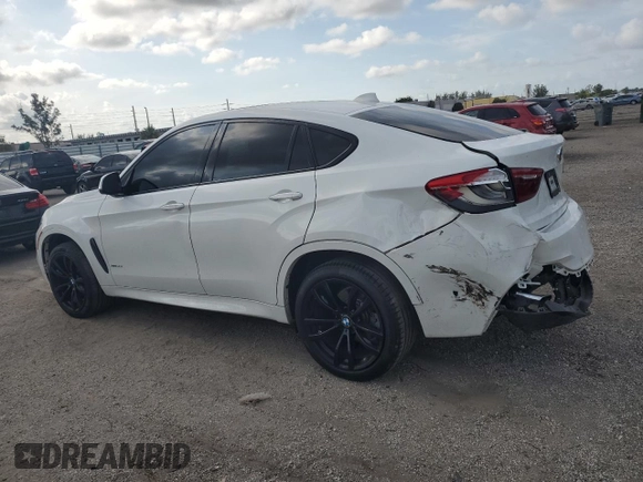 2019 BMW X6 xDrive35i with VIN 5UXKU2C5XK0Z64512, listed as a Copart auction lot 52157073 with 59,988 mi miles. Bid and sale history available at carsss.com. Image 2.
