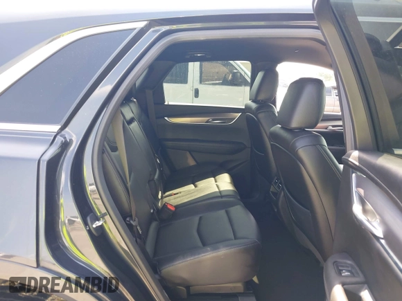 2023 Cadillac XT5 FWD Luxury с VIN 1GYKNAR40PZ193854, выставлен на аукционе IAAI как лот 42422246 с пробегом 26 053 миль миль и . История ставок и продаж доступна на DreamBid. Изображение 8.