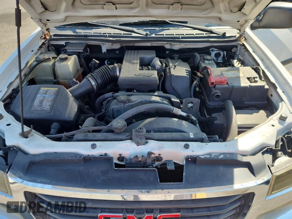 2008 GMC Canyon SLE1 with VIN 1GTCS19E088109552, listed as a Copart auction lot 65279225 with 191,816 mi miles and Salvage title. Bid and sale history available at DreamBid. Image 11.