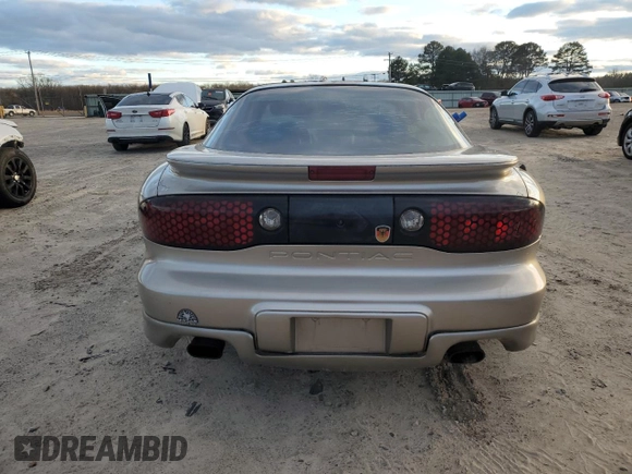 2001 Pontiac Firebird Firebird z VIN 2G2FS22K712109736, wystawiony jako Copart lot #87247004 z przebiegiem 84 965 mil mil oraz Czysty tytuł • Clean title. Historia ofert i sprzedaży dostępna na DreamBid. Obrazek 6.