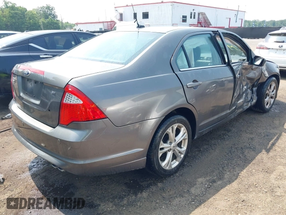 2012 Ford Fusion SE with VIN 3FAHP0HAXCR390109, listed as a IAAI auction lot 42470688 with 105,837 mi miles and . Bid and sale history available at DreamBid. Image 4.