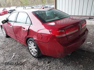 2010 Lincoln MKZ with VIN 3LNHL2GC0AR631012, listed as a IAAI auction lot 42003514 with 115,553 mi miles. Bid and sale history available at carsss.com. Image 3.