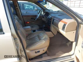 1999 Jeep Grand Cherokee Limited with VIN 1J4GW68N5XC687298, listed as a IAAI auction lot 42222106 with 126,067 mi miles and . Bid and sale history available at DreamBid. Image 5.