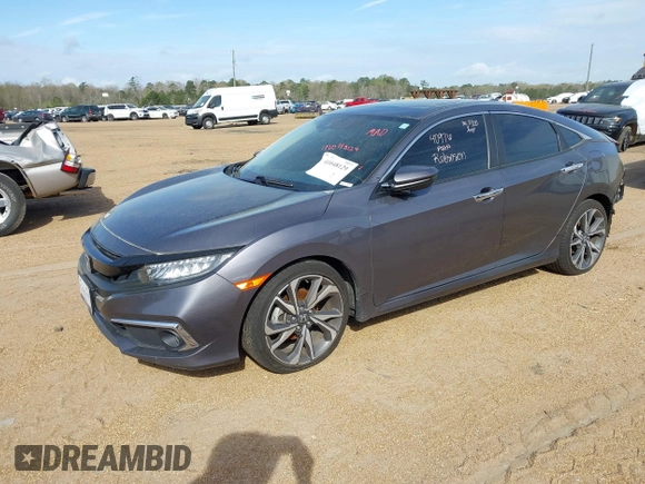 2020 Honda Civic Sedan Touring with VIN 19XFC1F97LE001901, listed as a IAAI auction lot 41048129 with 67,027 mi miles. Bid and sale history available at carsss.com. Image 2.