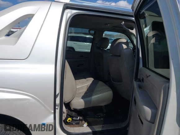 2004 Cadillac Escalade EXT z VIN 3GYEK62N24G294489, wystawiony jako IAAI lot #41887062 z przebiegiem 159 000 mil mil oraz . Historia ofert i sprzedaży dostępna na DreamBid. Obrazek 8.