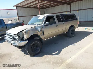 1999 Ford Ranger XL with VIN 1FTYR14X9XTA59675, listed as a IAAI auction lot 41861165 with 208,928 mi miles. Bid and sale history available at carsss.com. Image 2.