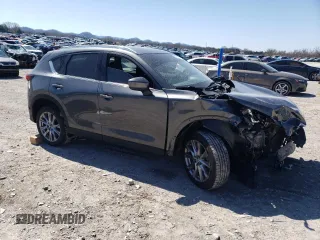 2020 Mazda CX-5 Grand Touring with VIN JM3KFADM4L0748126, listed as a Copart auction lot 50018615 with Not Provided miles and Salvage Title. Bid and sale history available at carsss.com. Image 4.