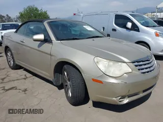2010 Chrysler Sebring Touring with VIN 1C3BC5ED7AN142671, listed as a IAAI auction lot 42021533 with 115,098 mi miles. Bid and sale history available at carsss.com. Image 1.