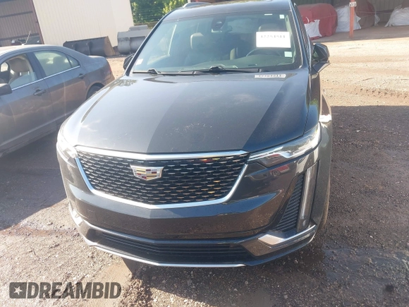 2020 Cadillac XT6 FWD Premium Luxury with VIN 1GYKPCRS0LZ206567, listed as a IAAI auction lot 42254511 with 80,443 mi miles and . Bid and sale history available at DreamBid. Image 13.