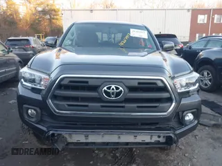 2017 Toyota Tacoma SR5 with VIN 3TMCZ5AN4HM104459, listed as a IAAI auction lot 41207997 with 80,103 mi miles and . Bid and sale history available at DreamBid. Image 11.