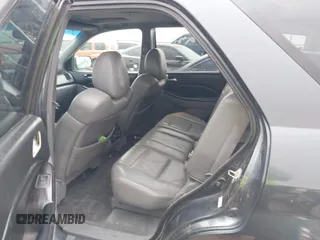 2006 Acura MDX Touring w/Navi with VIN 2HNYD18876H523408, listed as a IAAI auction lot 41756670 with 219,796 mi miles. Bid and sale history available at carsss.com. Image 8.