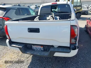 2019 Toyota Tacoma SR with VIN 5TFRX5GN9KX140351, listed as a IAAI auction lot 42593591 with 202,707 mi miles and . Bid and sale history available at DreamBid. Image 17.