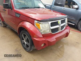 2007 Dodge Nitro SLT with VIN 1D8GT58K77W640112, listed as a IAAI auction lot 42015613 with 220,061 mi miles. Bid and sale history available at carsss.com. Image 6.
