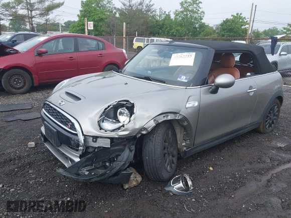 2016 MINI Convertible S z VIN WMWWG9C53G3A91095, wystawiony jako IAAI lot #42283353 z przebiegiem Nie podano mil oraz . Historia ofert i sprzedaży dostępna na DreamBid. Obrazek 2.