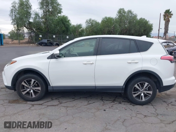 2018 Toyota RAV4 XLE with VIN JTMWFREV7JJ730811, listed as a IAAI auction lot 41075088 with 78,979 mi miles. Bid and sale history available at carsss.com. Image 14.