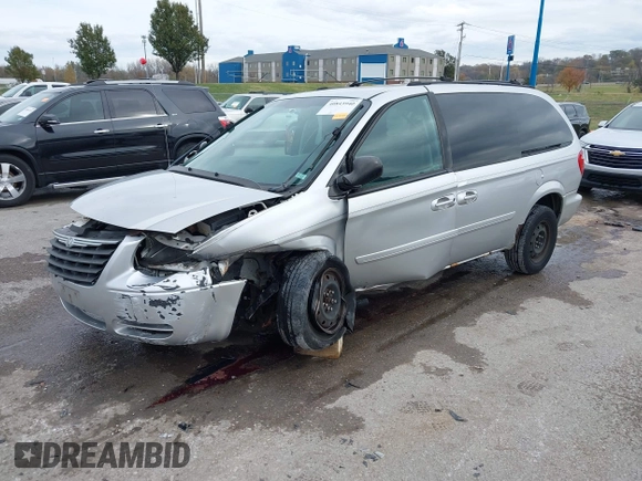 2005 Chrysler Town & Country LX with VIN 2C4GP44R95R307156, listed as a IAAI auction lot 40843940 with Not Provided miles and . Bid and sale history available at DreamBid. Image 18.