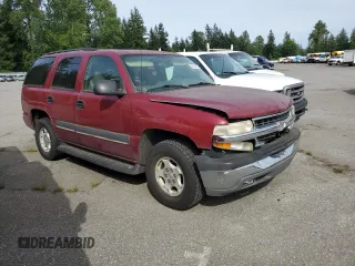 2004 Chevrolet Tahoe LS with VIN 1GNEC13V04R132890, listed as a Copart auction lot 56128195 with 174,907 mi miles and Clean title. Bid and sale history available at DreamBid. Image 4.