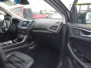 2020 Ford Edge SEL z VIN 2FMPK4J9XLBA78278, wystawiony jako IAAI lot #42181490 z przebiegiem 236 730 mil mil oraz . Historia ofert i sprzedaży dostępna na DreamBid. Obrazek 5.