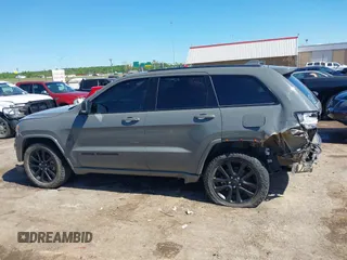 2019 Jeep Grand Cherokee Laredo E with VIN 1C4RJFAG8KC849782, listed as a IAAI auction lot 42151331 with 141,099 mi miles and . Bid and sale history available at DreamBid. Image 14.