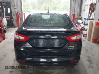 2013 Ford Fusion Titanium Hybrid with VIN 3FA6P0RU4DR281789, listed as a IAAI auction lot 41909115 with 161,008 mi miles and . Bid and sale history available at DreamBid. Image 17.