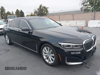 2022 BMW 7 Series 740i with VIN WBA7T2C0XNCJ31291, listed as a IAAI auction lot 40623307 with 98,877 mi miles. Bid and sale history available at carsss.com. Image 1.