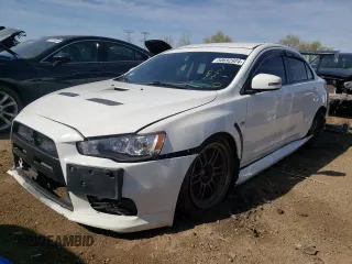 2015 Mitsubishi Lancer Evolution GSR z VIN JA32W8FV3FU022955, wystawiony jako Copart lot #50692924 z przebiegiem 88 882 mil mil oraz . Historia ofert i sprzedaży dostępna na DreamBid. Obrazek 1.
